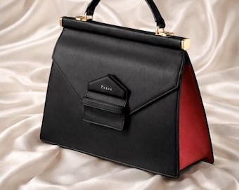 ブラックの構造的なレザー製トップハンドルハンドバッグ、ミニマルなオフィス用トートバッグ