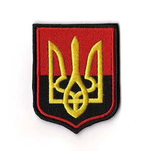 May include: Embroidered patch depicting the Ukrainian coat of arms, a golden trident, on a red and black shield. The patch has a black border and is designed for application on clothing or accessories.