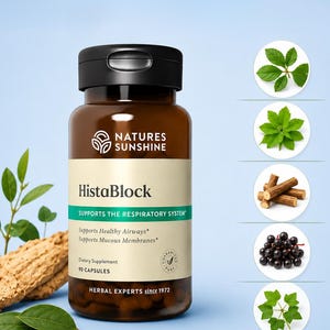 May include: A brown bottle of "HistaBlock" dietary supplement with a black cap, against a light blue background. The label includes text: "Supports the Respiratory System." The image also shows plant leaves, roots, and berries.