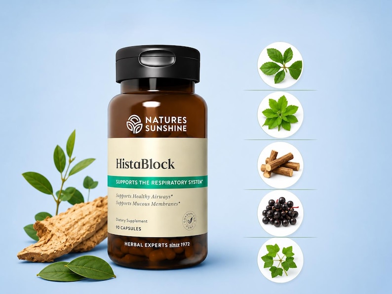 May include: A brown bottle of "HistaBlock" dietary supplement with a black cap, against a light blue background. The label includes text: "Supports the Respiratory System." The image also shows plant leaves, roots, and berries.