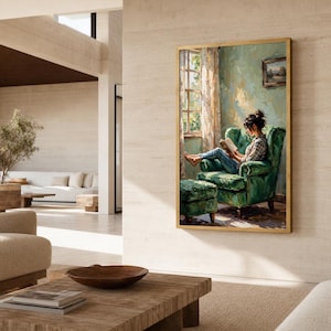 May include: A vertical framed painting depicting a person sitting in a green armchair with a matching ottoman, reading a book by a window. The scene features soft light, textured brushstrokes, and a small framed picture on the wall behind.