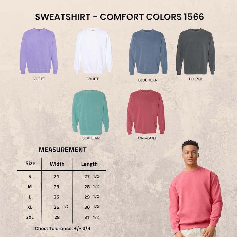 May include: A collection of Comfort Colors 1566 crewneck sweatshirts in violet, white, blue jean, pepper, seafoam, and crimson. A measurement chart displays widths and lengths in inches for sizes S to 2XL, with a chest tolerance of +/- 3/4 inches.