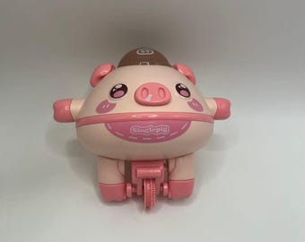 Cerdito de juguete en equilibrio: giroscopio antiestrés, componentes electrónicos