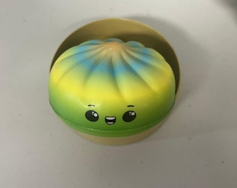 Juguete antiestrés Mystery Bao Bun Squishy con caja vaporera