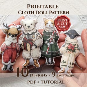 May include: A printable cloth doll pattern featuring four illustrated figures: a reindeer in a red suit, a bear holding a gift, a cat with a candy cane, and a black animal figure holding a poinsettia. Text includes "Printable Cloth Doll Pattern", "Print & Cut Sew", and "10 Designs + 9 Backdrops PDF + Tutorial".