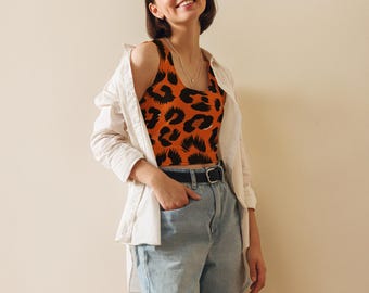 Top corto sin mangas con estampado de leopardo naranja