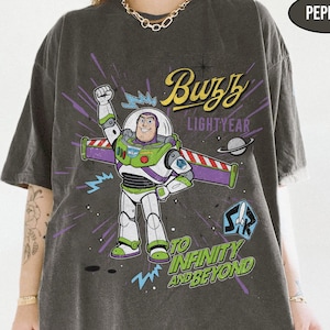 May include: A set of three ceramic mugs with a speckled, matte finish. The mugs are in shades of cream, light gray, and dark gray. Each mug has a simple, minimalist design, perfect for coffee or tea.