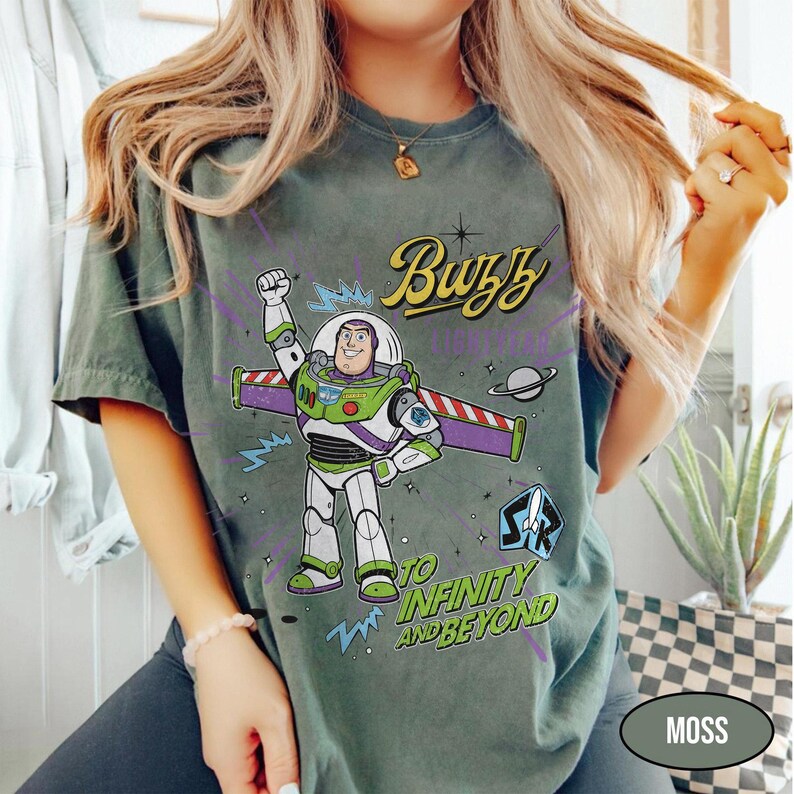 May include: A set of three ceramic mugs with a speckled, matte finish. The mugs are in shades of cream, light gray, and dark gray. Each mug has a simple, minimalist design and a rounded handle. The mugs are likely for coffee or tea.