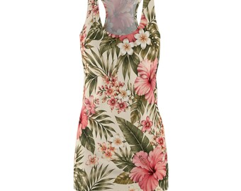 May include: A racerback tank top featuring a cream-colored base with a vibrant tropical print. The design includes large pink hibiscus flowers, smaller white plumeria blossoms, and various green palm leaves scattered across the entire garment.