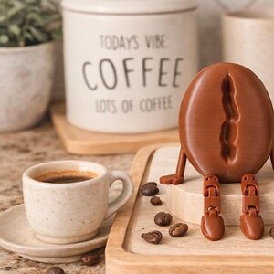 3D printed coffee buddy, articulated coffee cup figure, coffee lover desk decor, cute office gift, coffee mug character,3D printed coffee mug buddy, articulated coffee cup toy, coffee lover gift, desk decoration, office coffee lover decor.

Articulated 3D printed coffee cup character, coffee lover desk buddy, cute coffee mug figure, office gift idea,3D printed coffee mug figure, coffee lover articulated buddy, desk decor for coffee lovers, fun office decoration