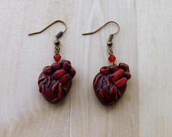 Steampunk anatomical heart earrings – handmade in fimo with red crystals