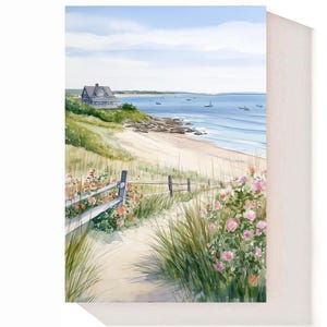May include: A watercolor painting of a coastal scene featuring a sandy path lined with green beach grass and pink flowers leading toward a beach. A wooden fence runs along the path, and a house sits on a grassy hill overlooking the blue ocean.
