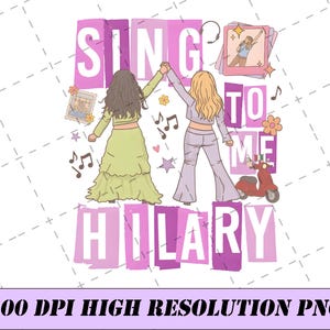 May include: A graphic design featuring the text SING TO ME HILARY in white letters on purple blocks. Two figures stand with arms raised, one in a green skirt and one in lavender pants. Includes a red scooter, musical notes, stars, and a photo frame.
