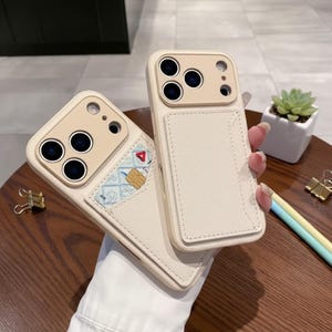 May include: A set of three ceramic mugs with a speckled, matte finish. The mugs are in shades of cream, light gray, and dark gray. Each mug has a simple, minimalist design, perfect for coffee or tea.