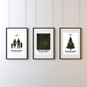 May include: Three framed vertical posters with white borders. The left shows a family silhouette, the center a black and gold city map with a red marker, and the right a Christmas tree silhouette. All feature the text THE WILLIAM'S CHRISTMAS 2026.