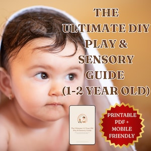 May include: A digital guide titled THE ULTIMATE DIY PLAY & SENSORY GUIDE (1-2 YEAR OLD) featuring a small thumbnail of the cover and a red starburst badge stating PRINTABLE PDF + MOBILE FRIENDLY, displayed next to a baby wrapped in a white cloth.