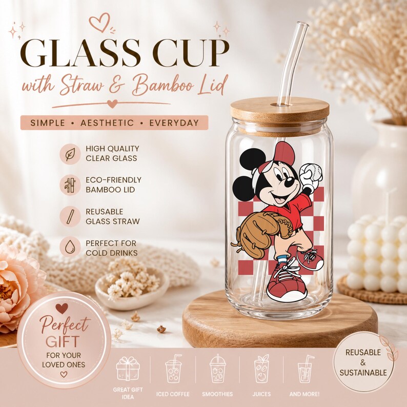 May include: A clear glass cup with a bamboo lid and straw. The cup features a Mickey Mouse baseball design. Text on the image reads "GLASS CUP with Straw & Bamboo Lid" and "Perfect Gift for your loved ones."