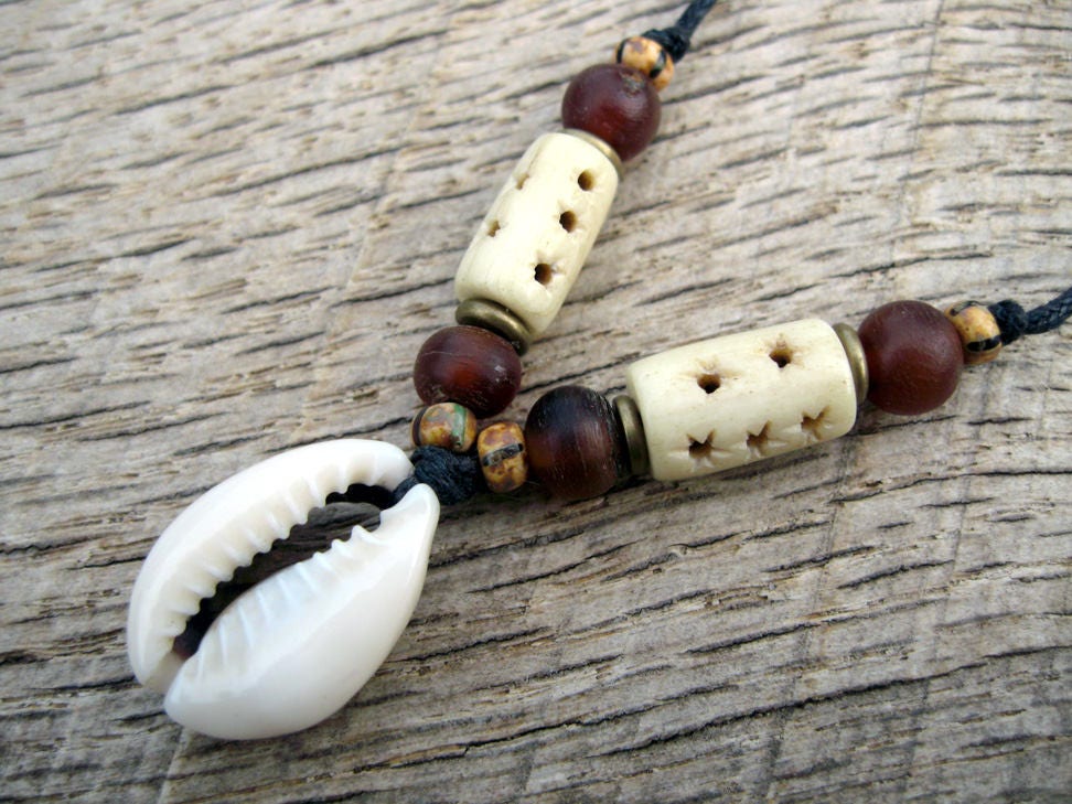 Mens tribal cowrie shell necklace cowrie pendant with carved Etsy