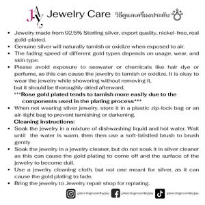 May include: A guide to jewellery care, featuring text in English and Thai. The document offers advice on cleaning and maintaining sterling silver and gold-plated jewellery, including storage and cleaning instructions.