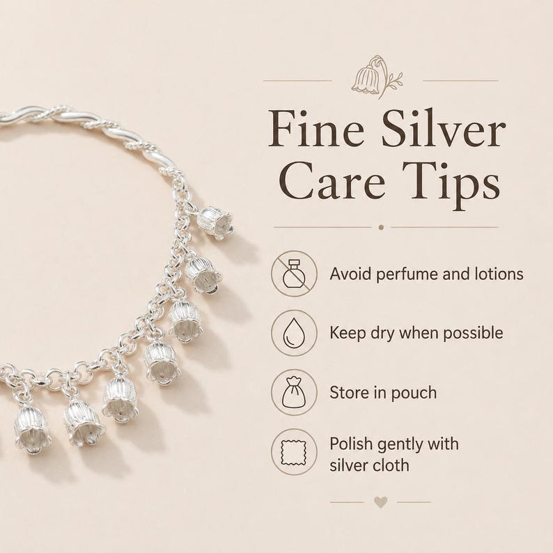May include: A silver bracelet featuring multiple bell-shaped flower charms. The text reads: Fine Silver Care Tips, Avoid perfume and lotions, Keep dry when possible, Store in pouch, Polish gently with silver cloth. Icons include a bottle, drop, pouch, and cloth.