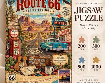 May include: A Route 66 themed jigsaw puzzle box featuring a vintage desert highway scene with a classic teal car, a motel sign, a gas pump, a guitar, and a map. The box displays text including Route 66, The Mother Road, and options for 200, 300, 500, and 1000 pieces.