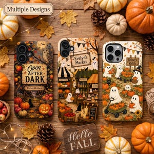 May include: Three phone cases featuring autumn themes. The left case shows an owl and pumpkins with text reading Open After Dark Parker Orchard. The center case depicts a market with text reading Evelyn's Market. The right case shows ghosts with pumpkins.