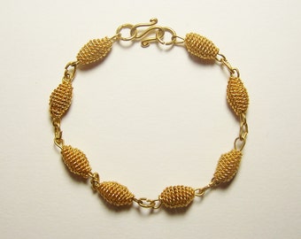 HANDMADE GOLDTONE BRACELET - Rich Gold Metal with the Look of 22 Karat Gold - 7 3/4 in. (19.8 cm)