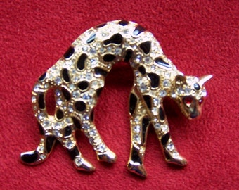 ELEGANT CHEETAH BROOCH - Gold Plated with All-over Simulated Pave'  & Black Enamel - Red Rhinestone Eyes