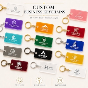 May include: A collection of rectangular acrylic keychains in 14 colours, each featuring a unique business logo and name. The keychains measure 60 x 30 x 4 mm and include metal rings in gold, silver, or black. Text reads CUSTOM BUSINESS KEYCHAINS.