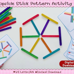 May include: A Popsicle Stick Pattern Activity #2 set featuring a digital download of pattern cards and a collection of colorful wooden sticks arranged in a radial design. The cards display various geometric patterns for educational play.