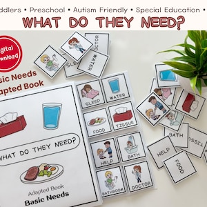 May include: A white spiral-bound adapted book titled "What Do They Need?" with matching picture cards. The book and cards feature illustrations of basic needs like food, water, and sleep. A digital download is indicated with a red circle.