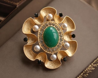 Vintage bloemenbroche met groene edelsteen, goudkleur met parel en zwart kristal, vorstelijke statementpin