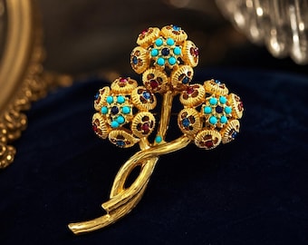 Vintage gouden bloemboeketbroche met veelkleurige stenen, statementspeld bloemen