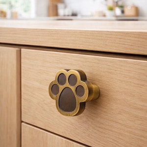 May include: A set of three ceramic mugs with a speckled, matte finish. The mugs are in shades of cream, light gray, and dark gray. Each mug has a simple, minimalist design, perfect for coffee or tea.