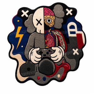 May include: A vibrant, cartoon rug depicting a character with a skull face and exposed brain, holding a game controller. The rug has an unusual, irregular shape with a blue lightning bolt and the text "eHeritageknots".