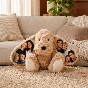 May include: A beige plush dog toy with long, floppy ears featuring printed photographs of various people. The stuffed animal has a textured, curly fur exterior, a dark brown nose, and smooth, light-colored fabric on the bottom of its paws.