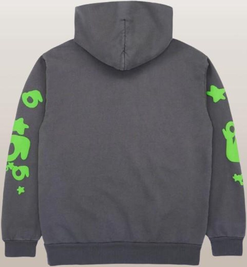 May include: A charcoal gray hoodie with a hood and long sleeves. The sleeves feature neon green graphics, including the number "6" and star shapes. The hoodie is made of a soft material and has a ribbed hem and cuffs.