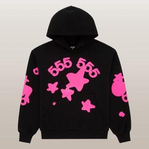 May include: Black hooded sweatshirt with a kangaroo pocket and a drawstring hood. The sweatshirt features the number "555" and star shapes in bright pink on the front and sleeves.