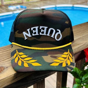 Custom Camo Rope Trucker Hat — “QUEEN” Upside‑Down Print, Laurel Embroidery, Snapback