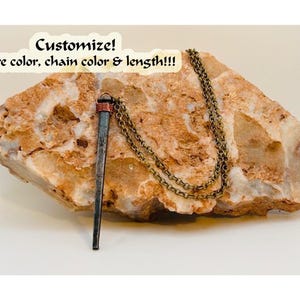 May include: A rustic wooden sign with the text "Welcome to our home" in white lettering. The sign features a distressed finish and a simple, inviting design, perfect for front door decor.