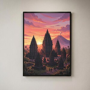 Può includere: Una stampa d'arte da parete incorniciata che raffigura un complesso di templi in pietra scura con guglie appuntite al tramonto. Il cielo è pieno di sfumature di nuvole arancioni, rosa e viola, con una sagoma di montagna sullo sfondo.