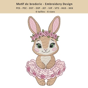 May include: An embroidery design featuring a charming bunny wearing a floral crown and a pink tutu. The bunny has large green eyes and a sweet expression. The text at the top reads "Motif de broderie - Embroidery Design".