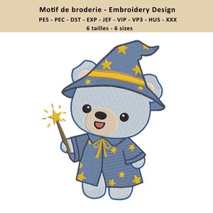 May include: An embroidered design of a light blue teddy bear dressed as a wizard, wearing a blue hat and robe with yellow stars. The bear holds a golden wand. Text at the top reads "Motif de broderie - Embroidery Design".