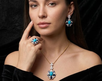 Conjunto de zafiro turquesa y circonita cúbica – Collar con colgante, pendientes y anillo en tono dorado – Circonita cúbica azul