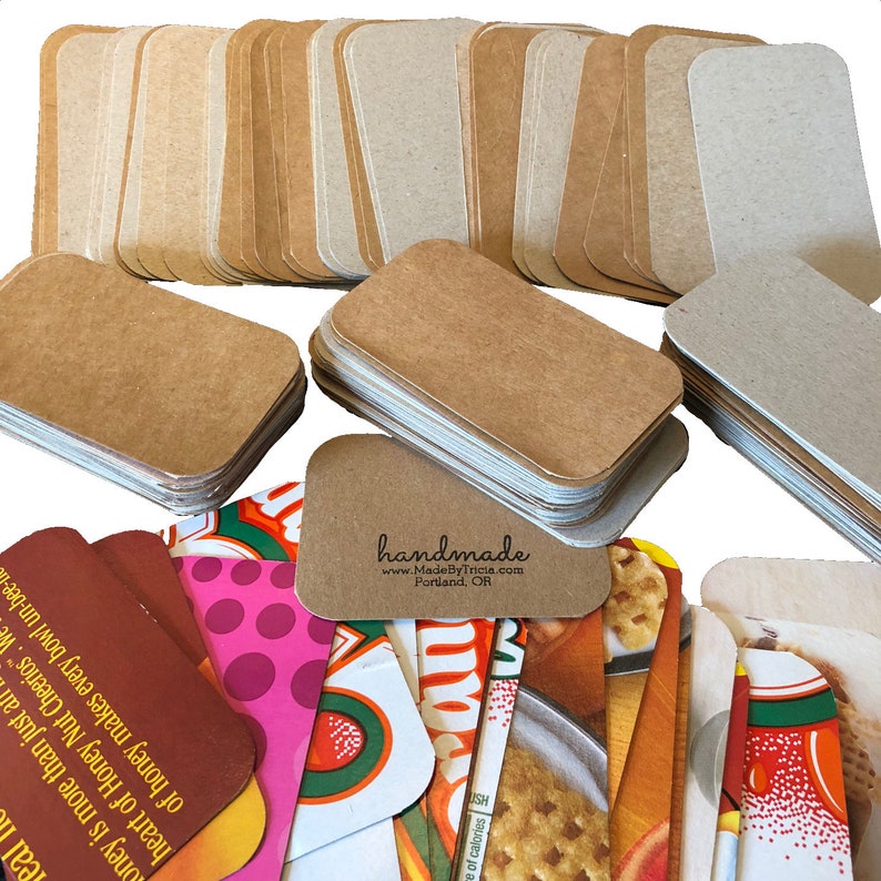 May include: A stack of 50 blank, brown, rounded-corner gift tags with the text "handmade" and website address "www.MadeByTricia.com" and location "Portland, OR".