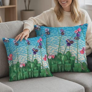 May include: A white ceramic mug with a black handle and the text "But First, Coffee" in a handwritten style. The mug is on a white surface. The mug is approximately 4 inches tall.