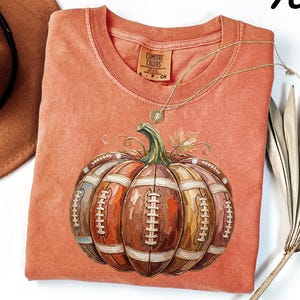 Comfort Colors® Football Pumpkin Shirt, Fall Football Tee, Autumn Sports Graphic Tee, Cute Game Day Pumpkin Shirt, Football Season Tee