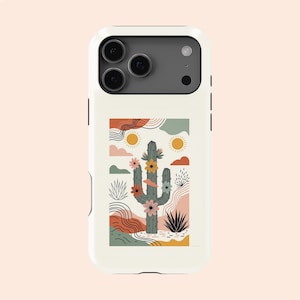 Könnte beinhalten: Eine weiße Handyhülle mit einer Illustration zum Thema Wüste. Das Design zeigt einen grünen Kaktus mit rosa und gelben Blüten, Sonnen, Wolken und abstrakten Formen in Orange, Grün und Braun. Die Hülle hat einen Kameraausschnitt und schwarze Seitentasten.