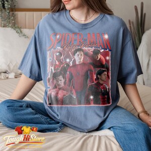 May include: A set of three ceramic mugs with a speckled, matte finish. The mugs are in shades of cream, light gray, and dark gray. Each mug has a simple, minimalist design, perfect for coffee or tea.