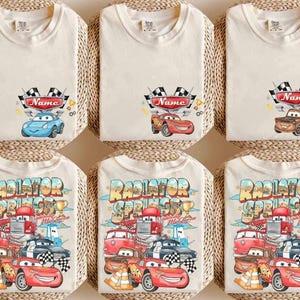 May include: A white ceramic mug with a black handle and the text "But First, Coffee" in a black, bold font. The mug is on a white surface. The mug is approximately 4 inches tall.